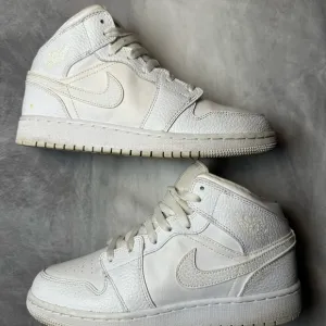 Nike Air Jordan 1 Mid White Sneakers