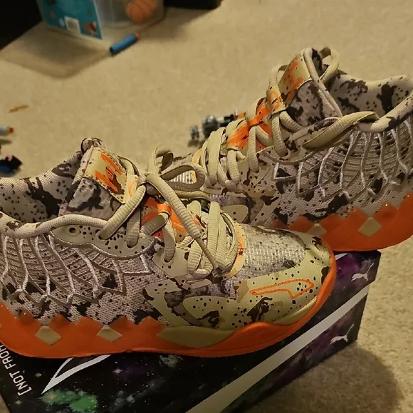 Puma Melo Kids Camouflage Sneakers with Orange Accents