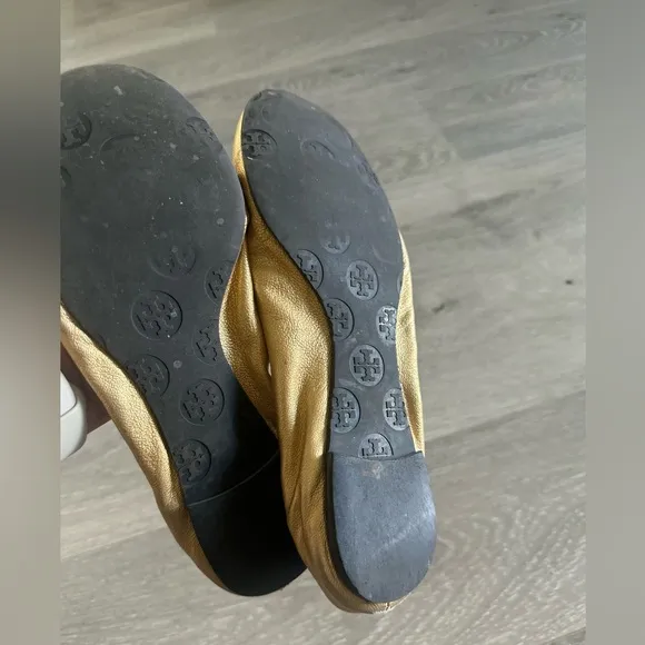 Tory Burch gold flats