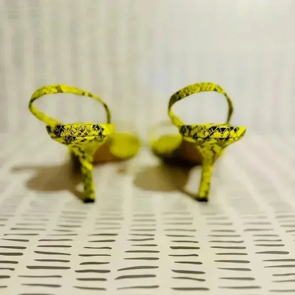 Women’s lime green snakeskin heels